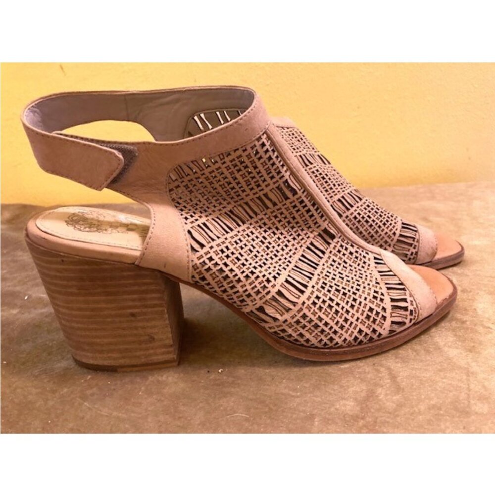 Vince Camuto tan perforated faux suede open toe sandals with velcro heel strap.